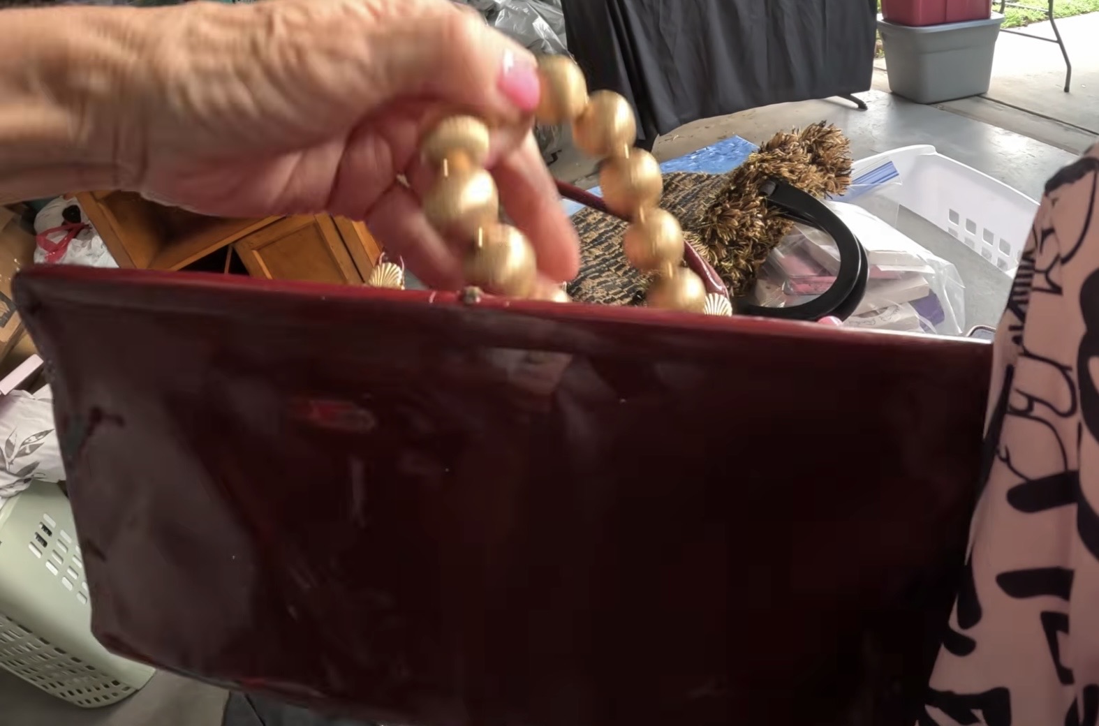 Close inspection of the gold-tone beads on a vintage necklace